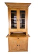 Tall display 
cabinet made of 
oak with glass 
doors and 
internal 
shelves with 
original key 
from ...