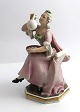 Bing & 
Grondahl. Lady 
blowing soap 
bubbles. Figure 
8044. Design: 
Tegner. Height 
16 cm. (1 
quality)