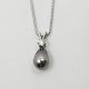 Necklace of 14k 
white gold, 
with a pendant 
of a large 
Tahitian 
cultured pearl, 
as well as a 
...