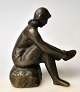 Danish artist (20th century) Girl putting on stockings. Bronze. Monogrammed: HJ. Cast at Brdr ...