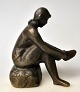 Danish artist 
(20th century) 
Girl putting on 
stockings. 
Bronze. 
Monogrammed: 
HJ. Cast at 
Brdr ...