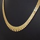 A necklace of 
14k gold, made 
at Jan 
Kjellerup.
Clasp with two 
safety catches.
L. 45 ...