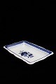 Royal 
Copenhagen 
Trankebar bread 
tray. 
Decoration 
number: 
11/1702. 
1.sort. H: 
4.5cm. L&W: ...