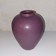 Vase In 
ceramics from 
the 1920s. 
Covered by a 
perfect purple 
glaze. In good 
condition with 
no ...