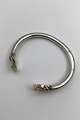 AB? Sterling 
Silver / 18 K 
Gold Bangle 
Meaures Diam 
inside 5.8 cm 
(2.38 inch) 
Weight 44.7 gr 
...