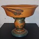 P. Ipsen: Large 
center pjece in 
ceramics (bowl 
on foot)  with 
decoration with 
birds, acorns 
and ...