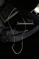 Old gold chain 
in 14 carat 
gold. Weight 
2.2 grams. 
Length: 44cm.