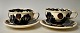 Herman A. 
Kähler, two 
teacups, 1930s, 
Næstved, 
Denmark. With 
blue, black and 
red glazes on a 
...