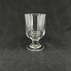 Height 14.5 cm.
The glass is 
mouth-blown 
with a clear 
crack 
underneath, 
fine lines in 
the ...