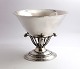 Georg Jensen. 
Silver bowl on 
oval base. 
Design no 6. 
Height 13 cm. 
Diameter 16 cm. 
Produced ...