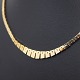 A necklace of 
14k gold, made 
at Jean Surel.
Clasp with two 
safety catches.
L. 42 cm.
Stamped ...