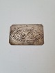 Votive in silver with motif of a pair of eyes Stamped 800Dimension 5 x 7.5 cm.