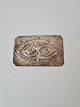 Votive in 
silver with 
motif of a pair 
of eyes 
Stamped 800
Dimension 5 x 
7.5 cm.