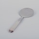 Georg Jensen 
Pyramid serving 
spoon in 
sterling silver 
and stainless 
steel.
1933-1944 ...