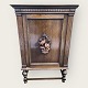Dark oak 
cabinet on legs 
with detailed 
decoration and 
key. 
Dimensions: 
HxWxD 
148x100x50 cm. 
Nice ...
