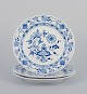 Meissen, 
Germany, three 
Blue 
Onion-patterned 
plates.
Hand-decorated 
with flowers.
Mid-20th ...