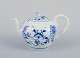 Stadt Meissen, 
Germany. Small 
Blue 
Onion-patterned 
teapot. Lid 
with flower 
bud. ...