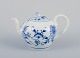 Stadt Meissen, Germany. Small Blue Onion-patterned teapot. Lid with flower bud. 
Hand-painted.