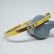 Oval bangle in 
18k gold, set 
with three 
diamonds, with 
a total of 
approx. 0.23 
ct.
The bangle ...