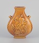 Harald Salomon for Rörstrand, Sweden. Ceramic vase with two handles.
Ochre yellow glaze. Mermaid and sea boy riding on a horse.