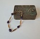 Vintage 
bracelet in 8 
kt gold with 
amethyst by 
Hermann 
Siersbøl
Stamp: HS-HS 
Length 19.8 
cm. ...