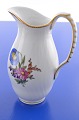 Royal 
Copenhagen 
porcelain. Hand 
painted Saxon 
flower, Milch 
jug, no. 
4/1609. Height 
...