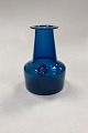 Holmegaard 
Capri petroleum 
blue Glass 
Vase. Designed  
by Jacob Eiler 
Bang. Measures 
16.3 cm x ...