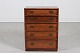 Henning Koch
Dresser made 
of rosewood 
with 5 drawers 
and brass 
handles
Design by ...