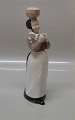 Bing and 
Grondahl B&G 
2126 Woman with 
eggs Svend 
Lindhart 22 cm 
Marked with the 
three Royal ...