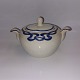 Villeroy & 
Boch: Blue Olga 
sugar bowl with 
lid. Several 
small "hair 
cracks" at the 
shell opening 
...