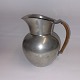 Just Andersen 
pewter:  Milk 
jug with 
braided bamboo. 
In good 
condition with 
no damage or 
...