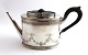 Michelsen. 
Silver teapot 
(830). Length 
22.5 cm. Height 
11 cm. Produced 
1887