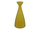 Kastrup 
Holmegaard, 
yellow vase 
with remains of 
the original 
label at the 
bottom.
Designed by 
...