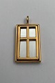 Georg Jensen 
Gilded Brass 
Window Pendent 
No. 5204 
Measures 5.0 cm 
x 2.5 cm (1.96 
inch x 0.98 ...