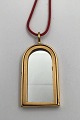 Georg Jensen 
Gilded Brass 
Window Pendent 
No. 5201 
Measures 5.5 cm 
x 2.5 cm (2.16 
inch x 0.98 ...