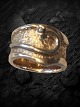 Lovely large modern hammered gold ring with brilliant cut diamond 14 carat gold.
