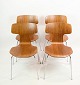 Bring iconic Danish design into your home with the T chair, designed by the legendary Arne ...