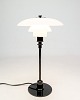 Experience the 
timeless 
elegance of 
Poul 
Henningsen's 
iconic design 
with this table 
lamp, model ...