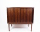 The small 
rosewood 
sideboard, of 
Danish design 
and from the 
1960s, 
represents an 
era of stylish 
...