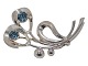 Herman Siersbøl 
Sterling 
silver, brooch 
with light blue 
stones from 
around 1970.
Hallmarked ...