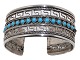 Wide silver 
bangle with 
blue stones, 
most likely 
from Asia.
Width 2.8 cm., 
inside ...