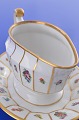 Henriette Royal 
Copenhagen 
porcelain, hand 
painted with 
flowers and 
gold. Henriette 
 Sauce boat ...