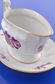 Royal 
Copenhagen 
porcelain. 
Purpur angular 
flower with 
gold. Royal 
Copenhagen,  
Sauce boat no. 
...