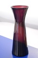 Violet colored 
hyacinth glass, 
Height 21.3 cm. 
 made by many 
Danish  
glassworks, 
circa ...