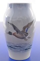 Royal 
Copenhagen 
porcelain. 
Small vase 
decorated with 
flying duck. 
no. 1087/88b. 
height 13.5 cm. 
...