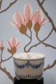 Bing & Grondahl 
Empire teapot 
warmer for 
coffee and 
teapot.
H: 8.5 cm. 
Dia.: 12cm. 
Decoration ...