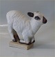 Bing & Grondahl 
Stoneware. B&G 
Art Pottery 
7006 Lamb 14 cm 
K. O. Johansen 
- candlestick 
In nice ...