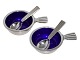 Georg Jensen 
Bernadotte 
sterling 
silver, salt 
jar with blue 
enamel and salt 
spoon.
Design ...