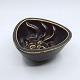 Jais Nielsen 
for Saxbo; 
Ceramic bowl, 
decorated in 
brown glaze, 
with a motif of 
Medusa on the 
...