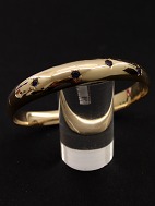 14 carat gold bangle with amethysts